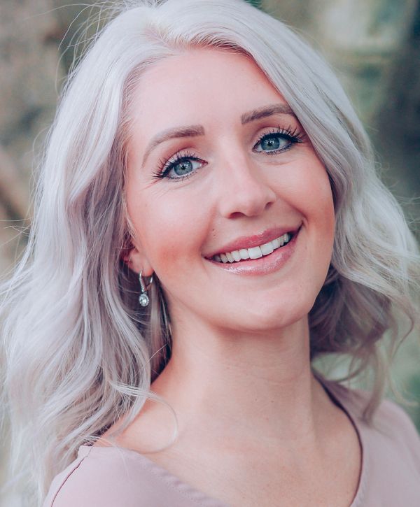 root canal therapy patient model smiling broadly